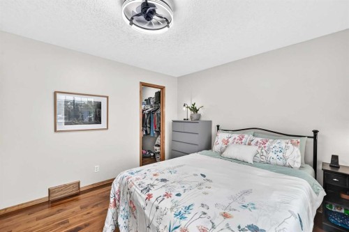 145 Panamount Place Nw, Calgary, AB - Indoor Photo Showing Bedroom