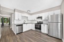 96 Erin Woods Boulevard Se, Calgary, AB  - Indoor Photo Showing Kitchen With Stainless Steel Kitchen With Double Sink With Upgraded Kitchen 