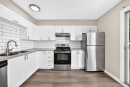 96 Erin Woods Boulevard Se, Calgary, AB  - Indoor Photo Showing Kitchen With Stainless Steel Kitchen With Double Sink With Upgraded Kitchen 