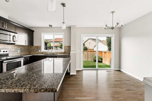 59 Elgin Meadows Park Se, Calgary, AB - Indoor Photo Showing Kitchen With Stainless Steel Kitchen With Double Sink With Upgraded Kitchen