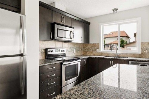 59 Elgin Meadows Park Se, Calgary, AB - Indoor Photo Showing Kitchen With Stainless Steel Kitchen With Upgraded Kitchen