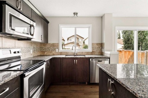 59 Elgin Meadows Park Se, Calgary, AB - Indoor Photo Showing Kitchen With Upgraded Kitchen