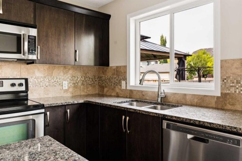 59 Elgin Meadows Park Se, Calgary, AB - Indoor Photo Showing Kitchen With Stainless Steel Kitchen With Double Sink With Upgraded Kitchen