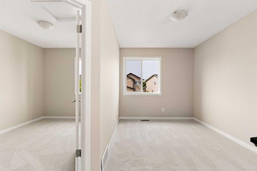 59 Elgin Meadows Park Se, Calgary, AB - Indoor Photo Showing Other Room
