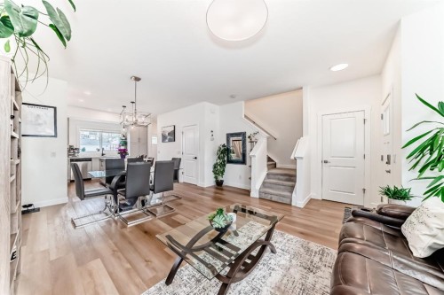 109-525 River Heights Drive, Cochrane, AB - Indoor Photo Showing Living Room