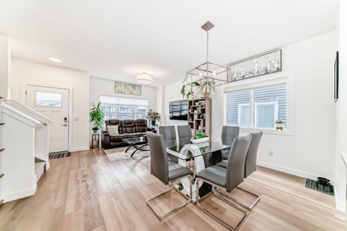 109-525 River Heights Drive, Cochrane, AB - Indoor Photo Showing Dining Room