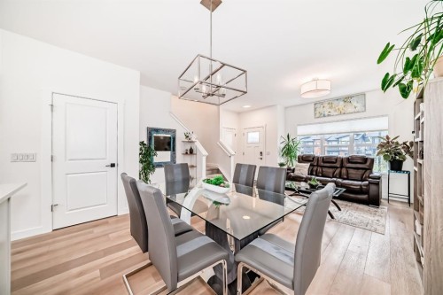 109-525 River Heights Drive, Cochrane, AB - Indoor Photo Showing Dining Room
