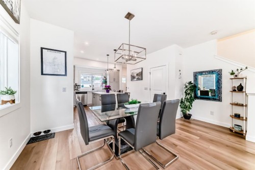 109-525 River Heights Drive, Cochrane, AB - Indoor Photo Showing Dining Room
