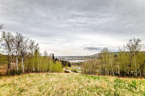 109-525 River Heights Drive, Cochrane, AB - Outdoor With View