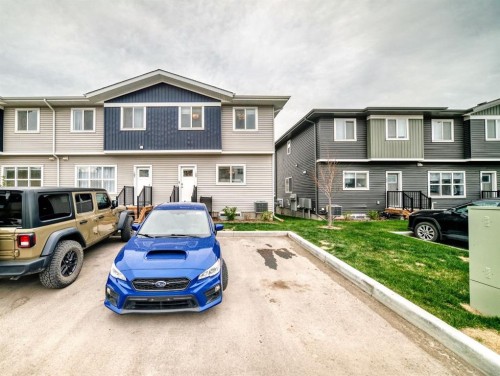 109-525 River Heights Drive, Cochrane, AB - Outdoor