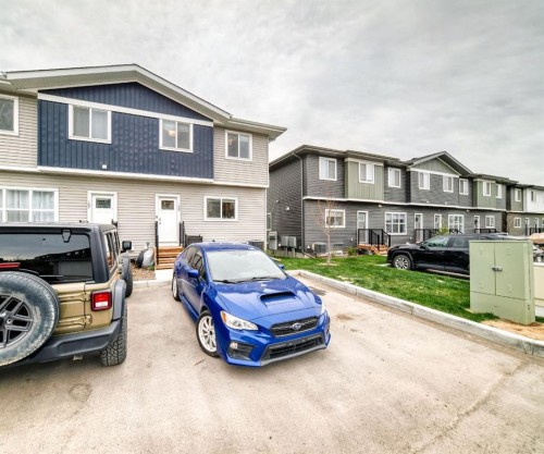 109-525 River Heights Drive, Cochrane, AB - Outdoor