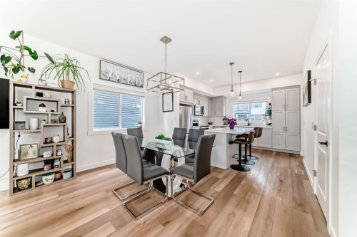 109-525 River Heights Drive, Cochrane, AB - Indoor Photo Showing Dining Room
