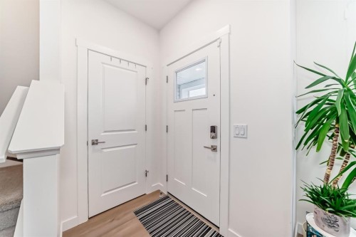 109-525 River Heights Drive, Cochrane, AB - Indoor Photo Showing Other Room