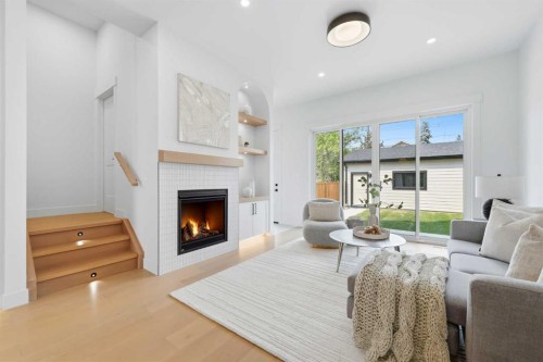 2714 3 Avenue Nw, Calgary, AB - Indoor Photo Showing Living Room With Fireplace