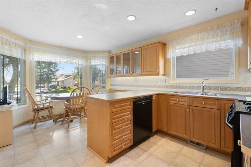 243 Radcliffe Place Se, Calgary, AB - Indoor Photo Showing Kitchen With Double Sink