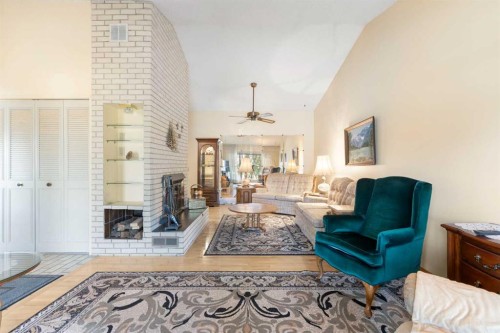 243 Radcliffe Place Se, Calgary, AB - Indoor Photo Showing Living Room With Fireplace