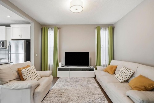 98 Panton Way Nw, Calgary, AB - Indoor Photo Showing Living Room