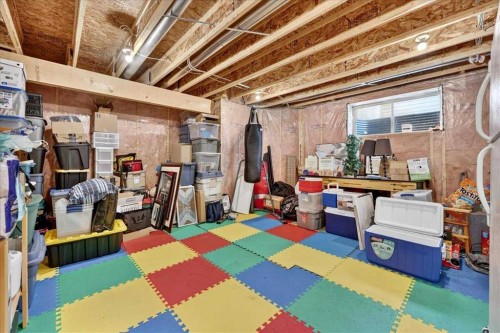1418 Kings Heights Boulevard Se, Airdrie, AB - Indoor Photo Showing Basement