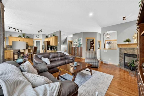 1418 Kings Heights Boulevard Se, Airdrie, AB - Indoor Photo Showing Living Room With Fireplace