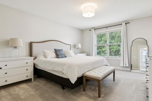 70 Cortina Way Sw, Calgary, AB - Indoor Photo Showing Bedroom