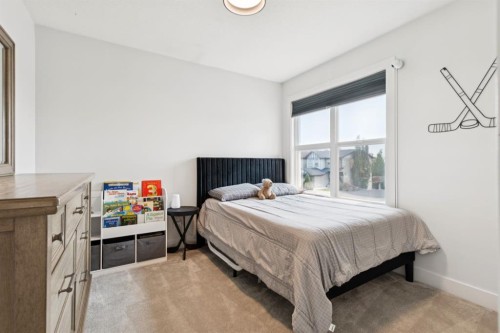 70 Cortina Way Sw, Calgary, AB - Indoor Photo Showing Bedroom