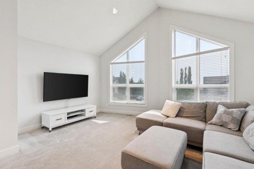 70 Cortina Way Sw, Calgary, AB - Indoor Photo Showing Living Room