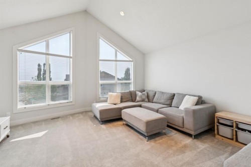 70 Cortina Way Sw, Calgary, AB - Indoor Photo Showing Living Room