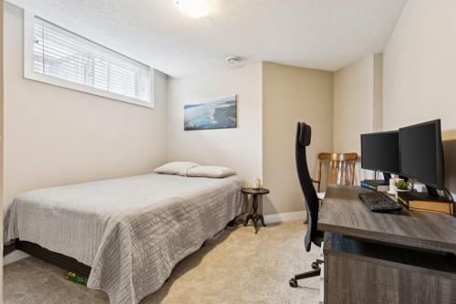 70 Cortina Way Sw, Calgary, AB - Indoor Photo Showing Bedroom