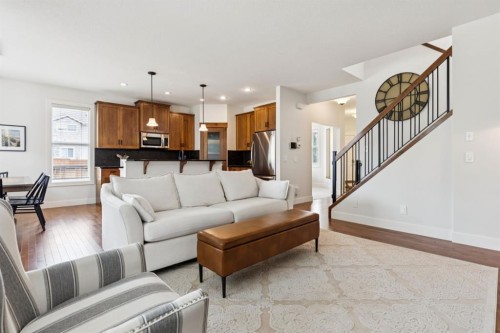 70 Cortina Way Sw, Calgary, AB - Indoor Photo Showing Living Room