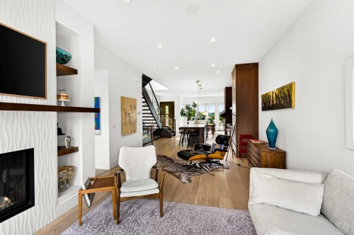 3936 1A Street Sw, Calgary, AB - Indoor Photo Showing Living Room With Fireplace