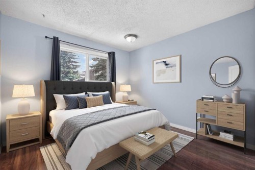 12-14736 Deerfield Drive Se, Calgary, AB - Indoor Photo Showing Bedroom