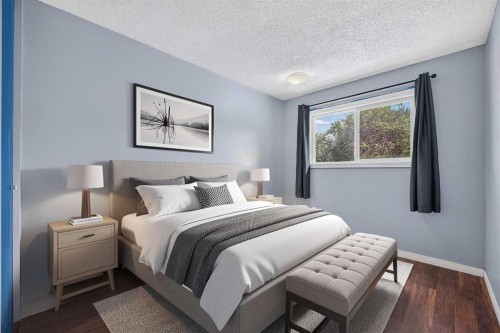 12-14736 Deerfield Drive Se, Calgary, AB - Indoor Photo Showing Bedroom