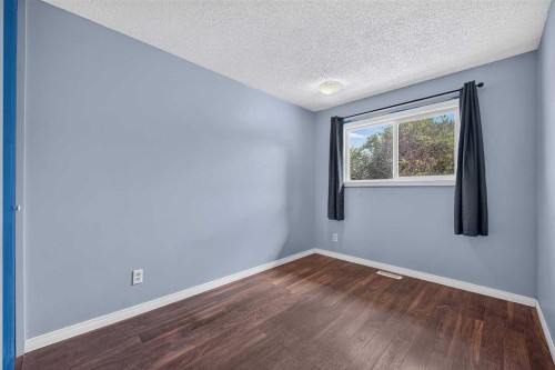 12-14736 Deerfield Drive Se, Calgary, AB - Indoor Photo Showing Other Room