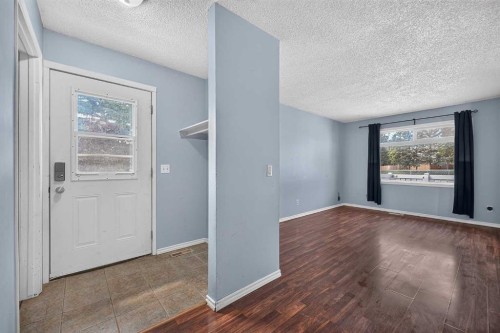 12-14736 Deerfield Drive Se, Calgary, AB - Indoor Photo Showing Other Room