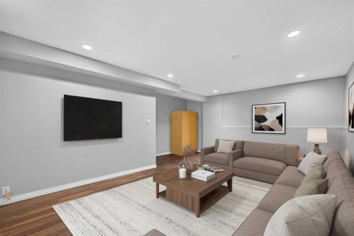 12-14736 Deerfield Drive Se, Calgary, AB - Indoor Photo Showing Living Room