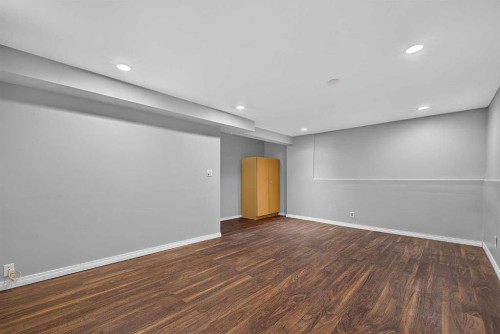 12-14736 Deerfield Drive Se, Calgary, AB - Indoor Photo Showing Other Room