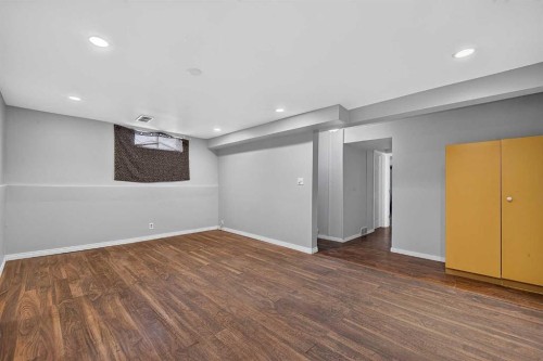 12-14736 Deerfield Drive Se, Calgary, AB - Indoor Photo Showing Other Room