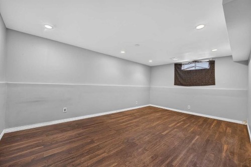 12-14736 Deerfield Drive Se, Calgary, AB - Indoor Photo Showing Other Room