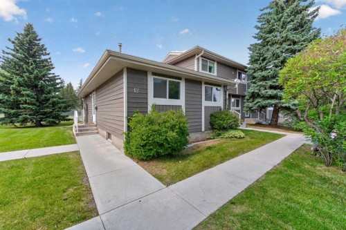 12-14736 Deerfield Drive Se, Calgary, AB - Outdoor With Facade