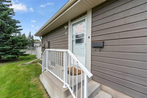 12-14736 Deerfield Drive Se, Calgary, AB - Outdoor With Exterior