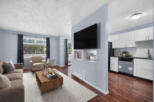 12-14736 Deerfield Drive Se, Calgary, AB - Indoor Photo Showing Living Room