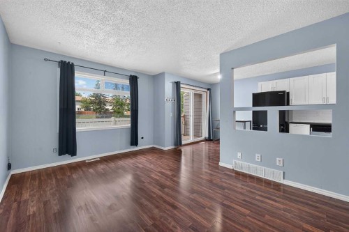 12-14736 Deerfield Drive Se, Calgary, AB - Indoor Photo Showing Other Room