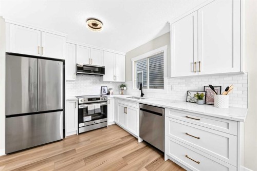 145 Sunvale Crescent Se, Calgary, AB - Indoor Photo Showing Kitchen With Stainless Steel Kitchen With Upgraded Kitchen