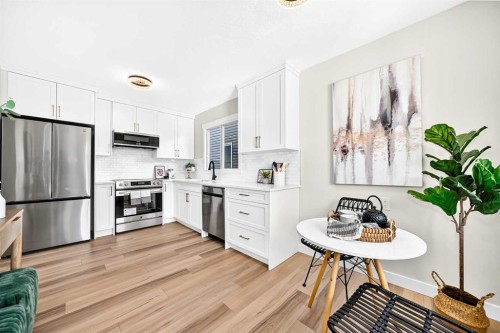 145 Sunvale Crescent Se, Calgary, AB - Indoor Photo Showing Kitchen With Stainless Steel Kitchen With Upgraded Kitchen