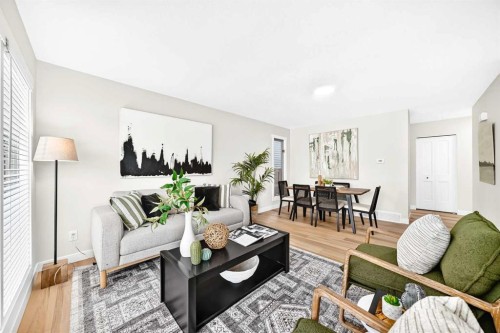 145 Sunvale Crescent Se, Calgary, AB - Indoor Photo Showing Living Room