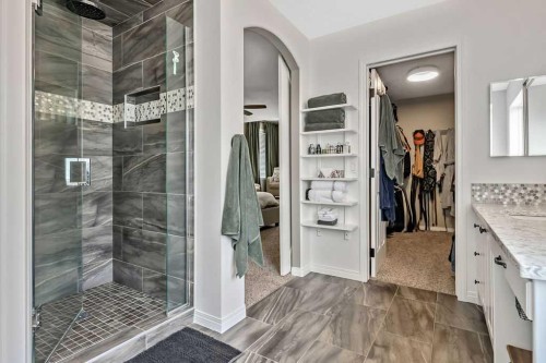 9 Sheep River Heath, Okotoks, AB - Indoor Photo Showing Bathroom