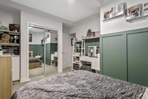 9 Sheep River Heath, Okotoks, AB - Indoor Photo Showing Bedroom