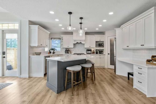 9 Sheep River Heath, Okotoks, AB - Indoor Photo Showing Kitchen With Upgraded Kitchen