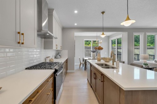 3 Tillotson Downs, Okotoks, AB - Indoor Photo Showing Kitchen With Double Sink With Upgraded Kitchen