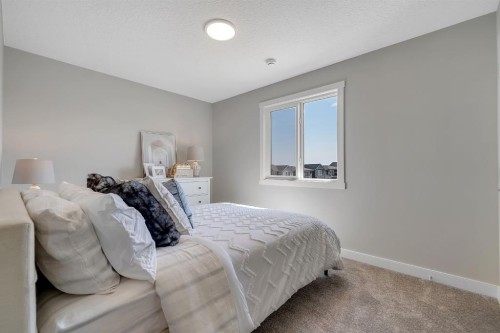 3 Tillotson Downs, Okotoks, AB - Indoor Photo Showing Bedroom